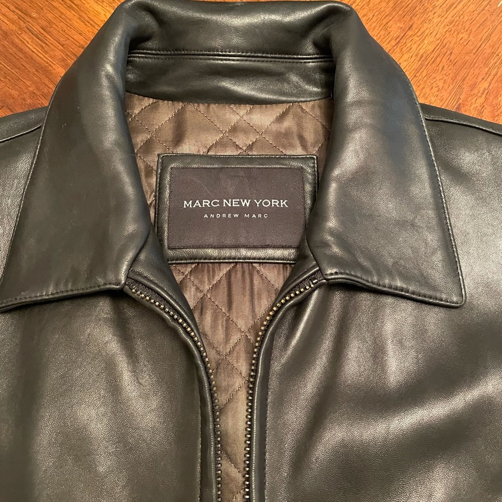 Andrew Marc Men XL Black Leather Jacket. Used in good condition, rip on sleeve